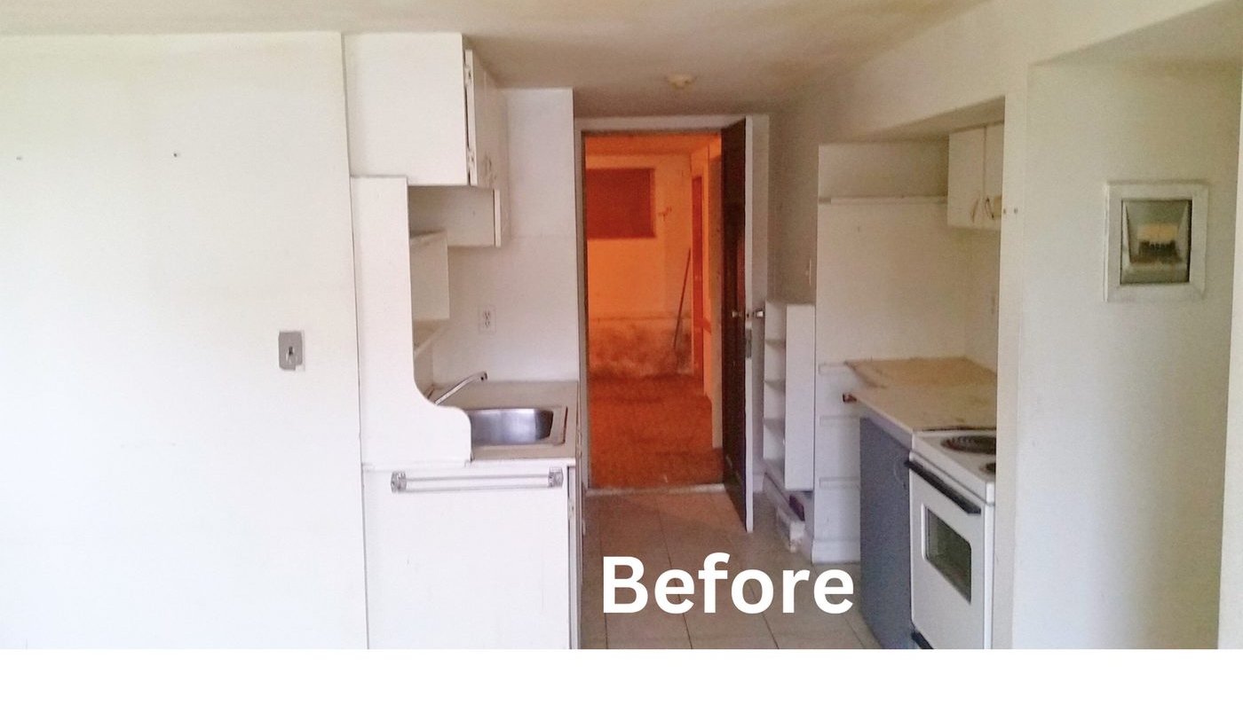 Unfinished Vancouver basement before renovation — exposed joists and concrete