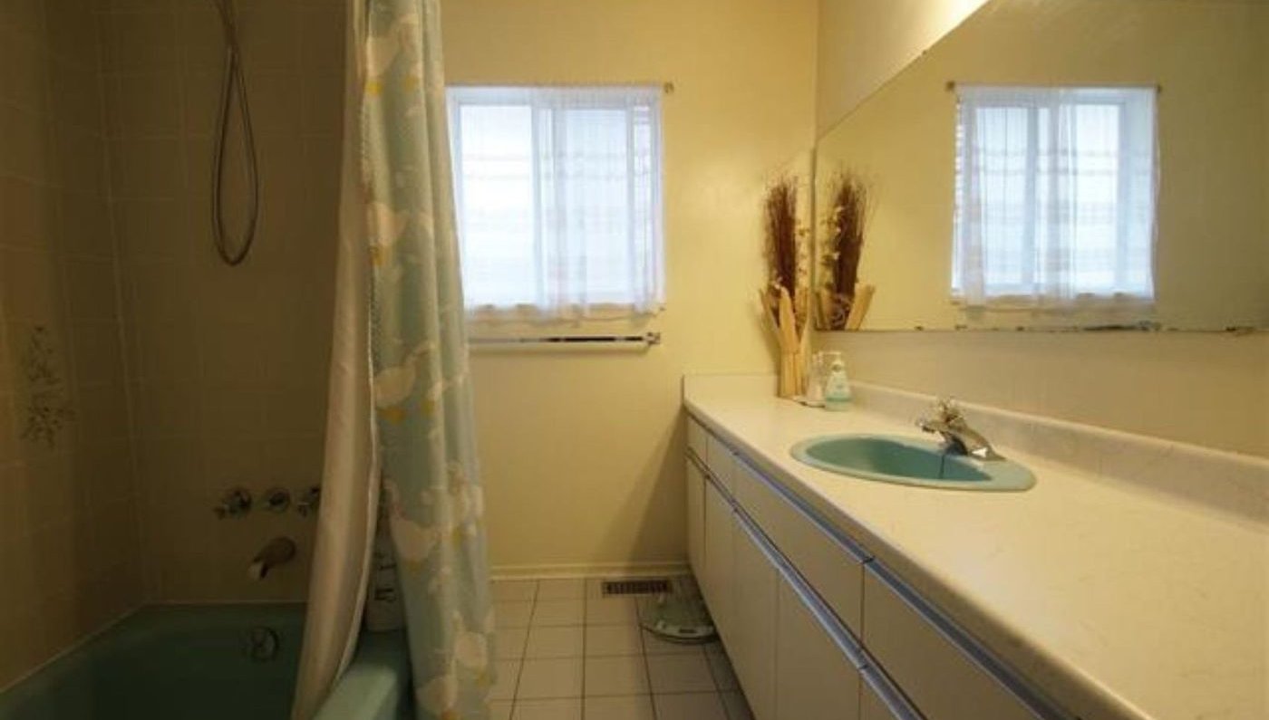 Dated ensuite bathroom before renovation in Vancouver